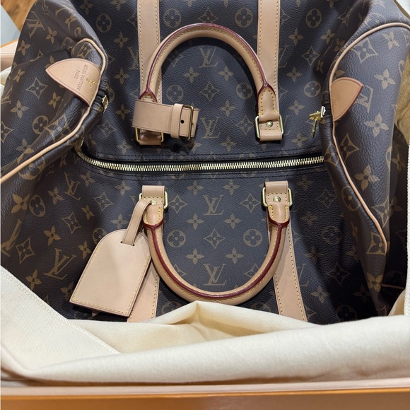 Louis Vuitton Handbags - Louis Vuitton Monogram Canvas Travel Bag with Natural Vachetta Trim